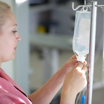 nurse with IV