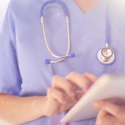 Nurse holding tablet