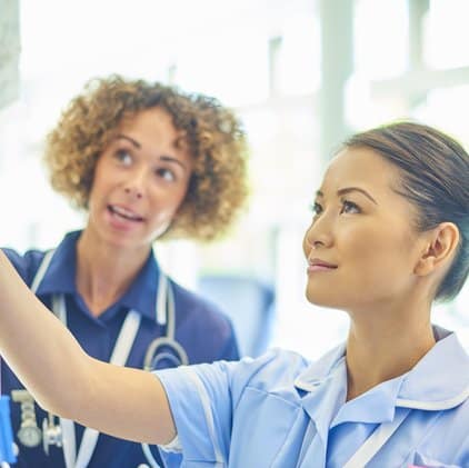 Nurses preparing IV