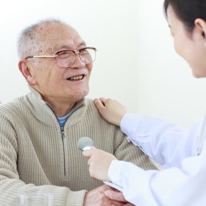 Elderly patient with doctor