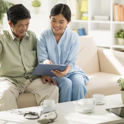 Nurse and patient at assisted living home