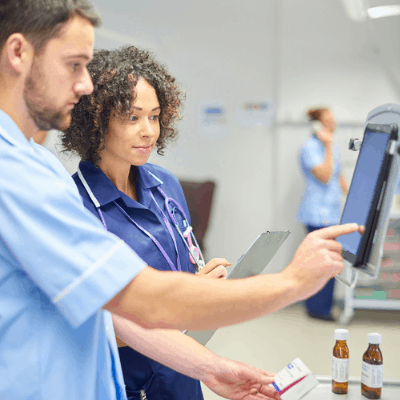 Pharmacist at computer